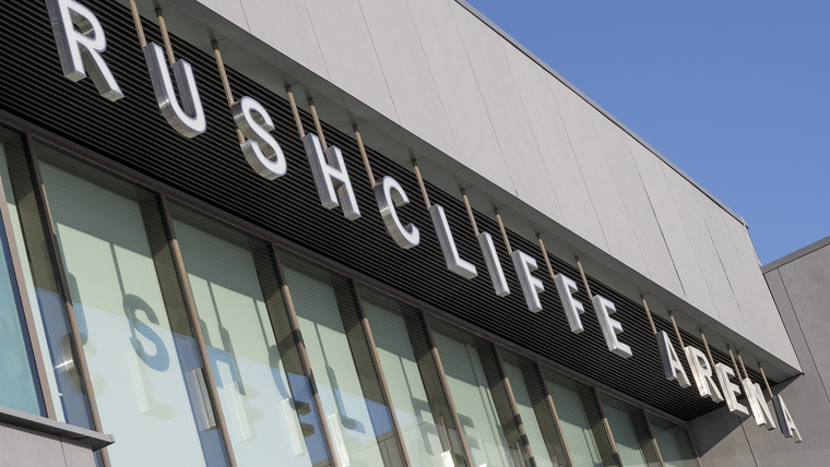 A close up photograph of the Rushcliffe Arena sign on the building