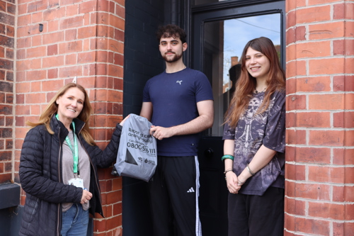 Students accepting Crime prevention kit