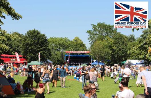 People enjoying a sunny day at Proms in the Park
